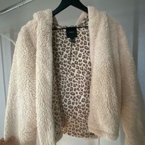 Women’s plush faux fur zip up sweater.